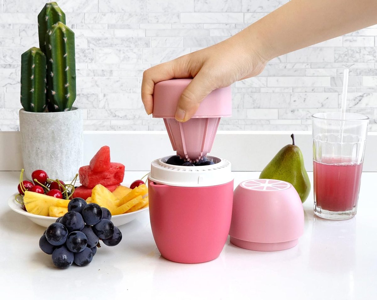 Pressing grapes with the pink cone